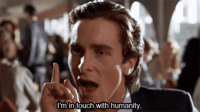 a gif from movie American Psycho with a text saying "I'm in touch with humanity"