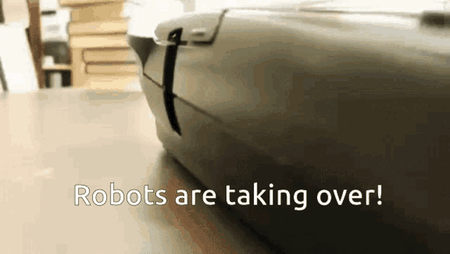 a gif of a printer printing "oof" with a text saying "robots are taking over"